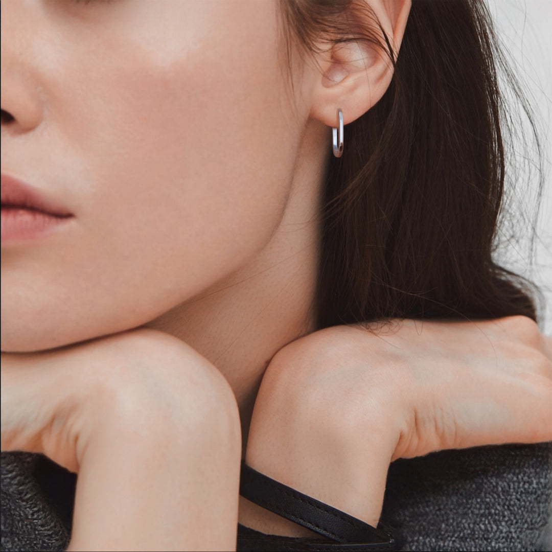 Sterling Silver Elongated Oval Huggie Earrings