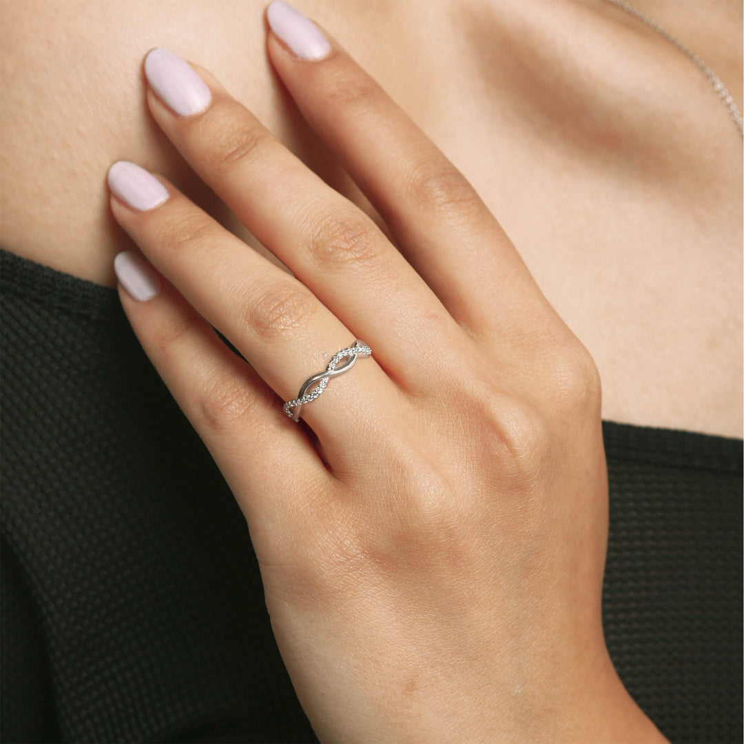 Infinity Twist Moissanite Band in Sterling Silver
